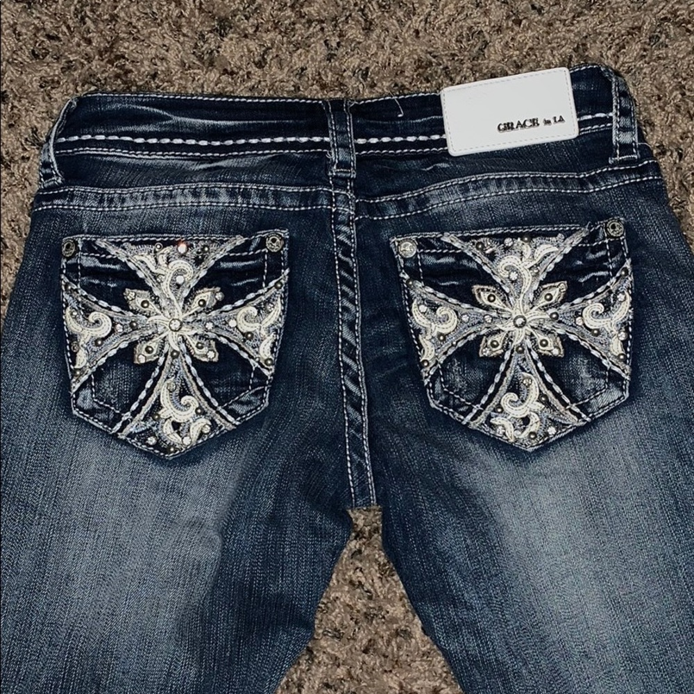 Boot Cut jeans with pocket embroidery